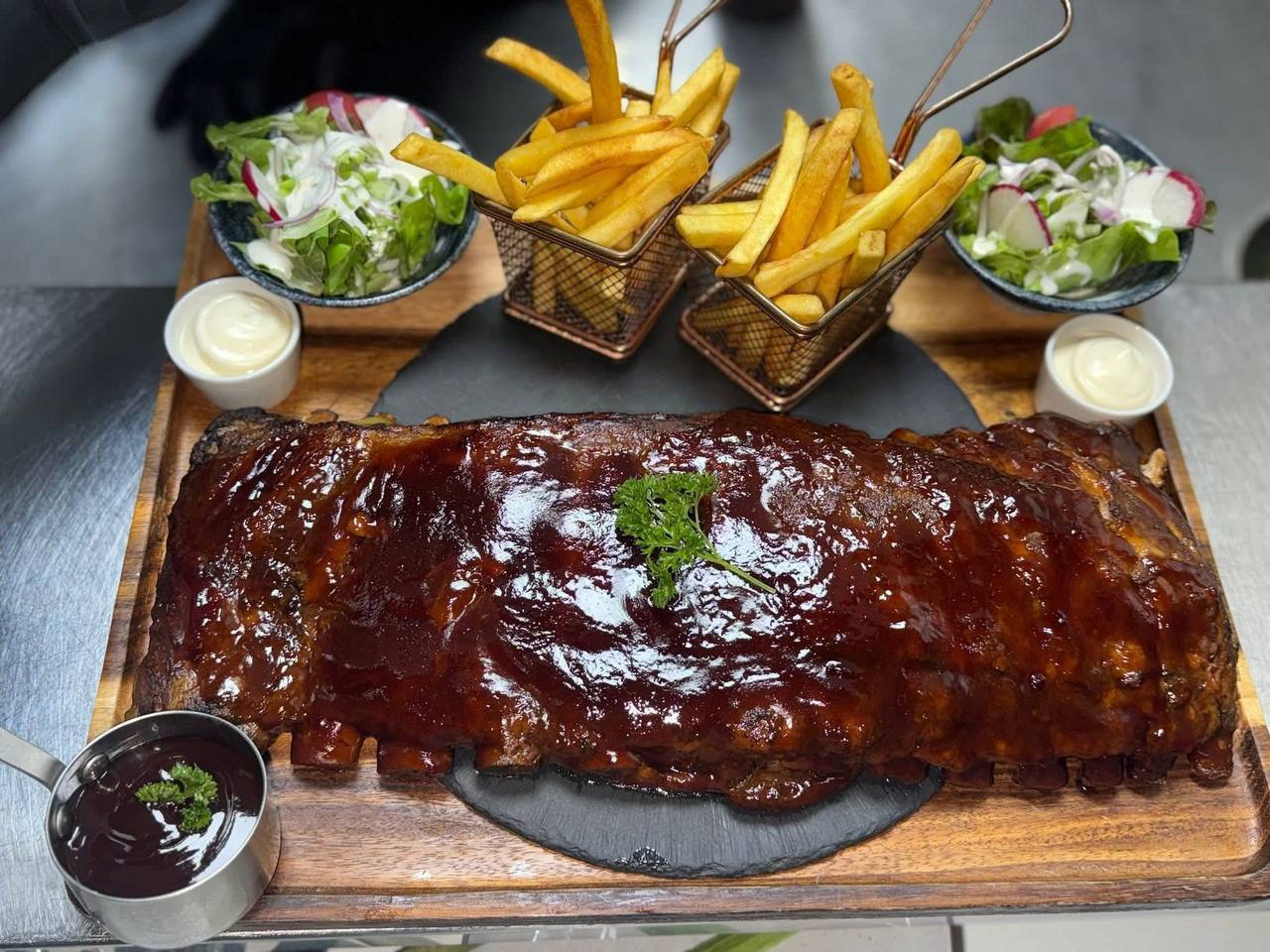 Full rack of BBQ ribs with sides