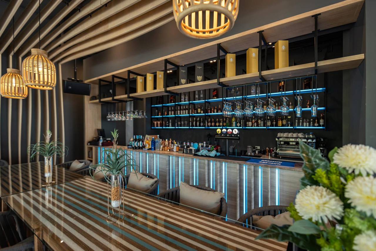 Bar seating with blue accent lighting