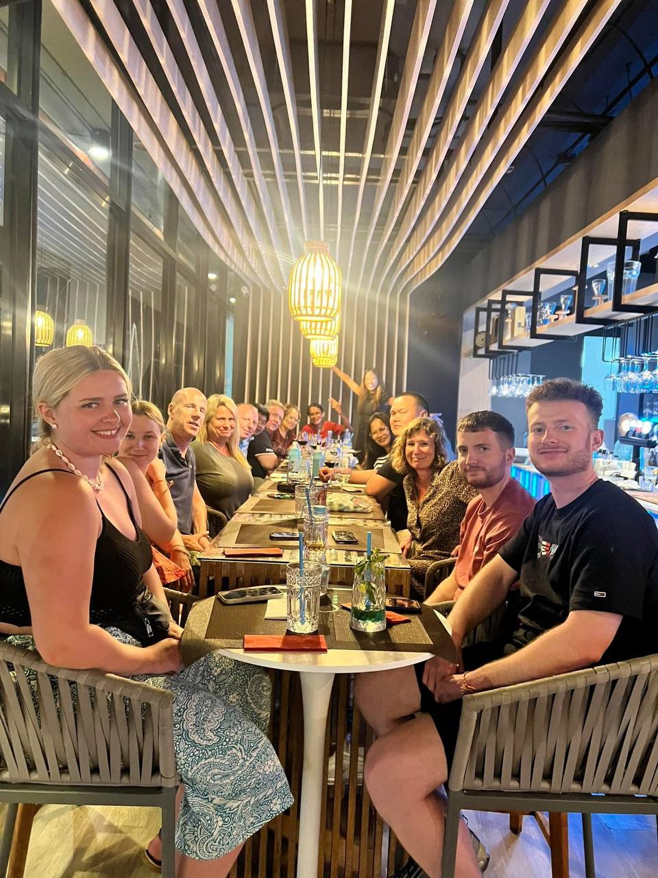 Group celebration under signature ceiling