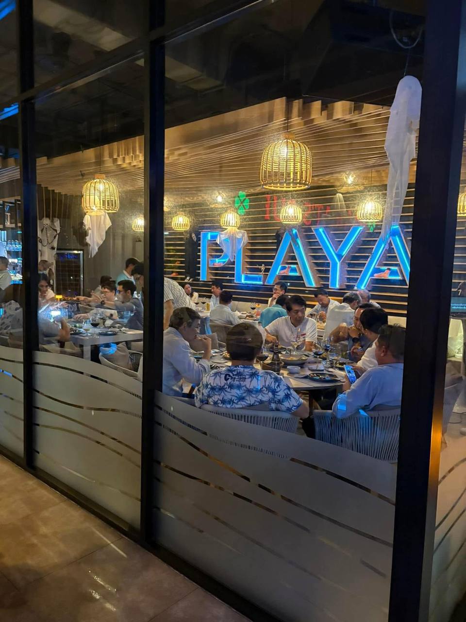 Evening atmosphere with PLAYA signage